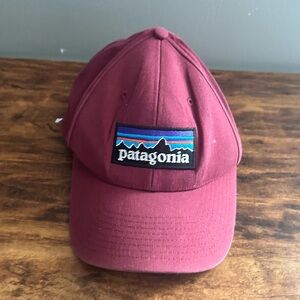 Patagonia maroon cap adjustable snap strap